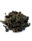Close up of Iron Goddess Of Mercy (Tie Guan Yin) loose leaf Oolong tea from Very Craftea